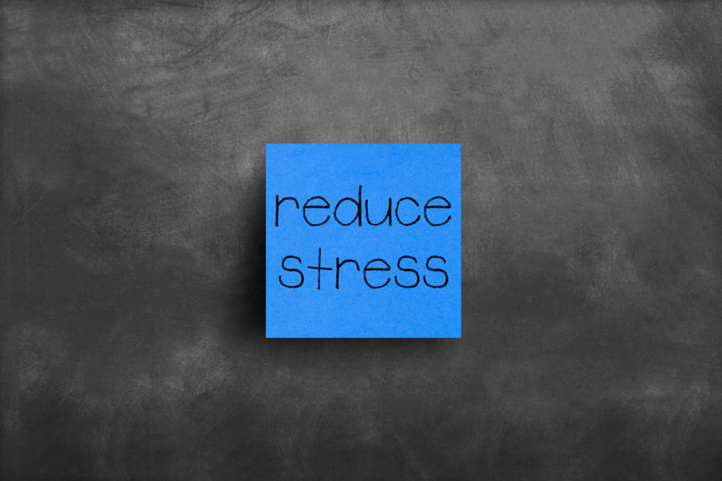Sticky note on blackboard, Reduce stress